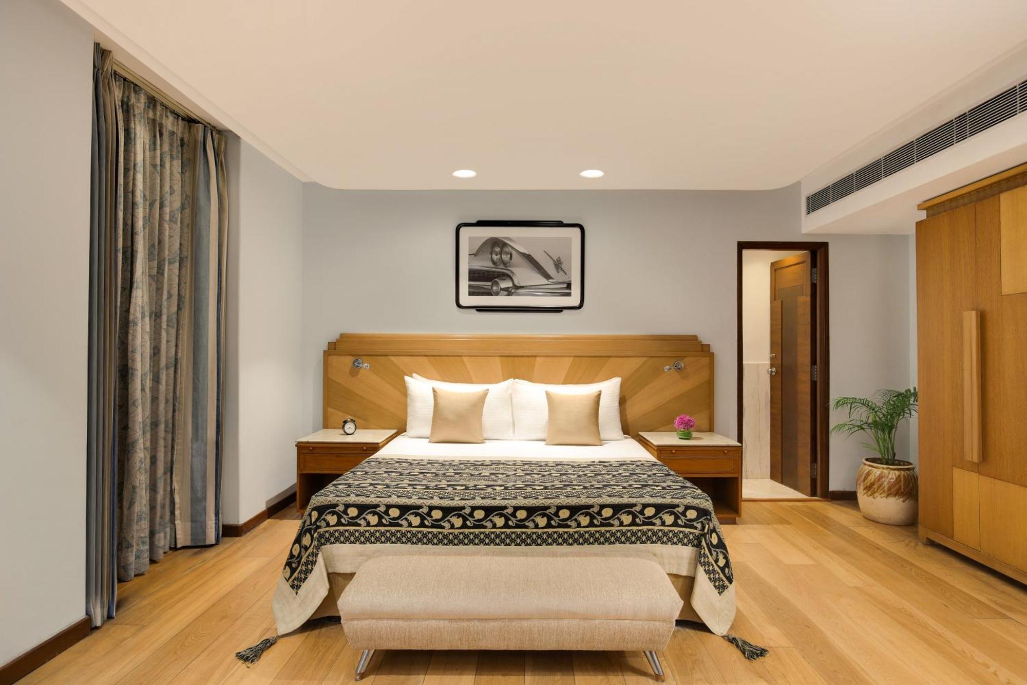 Ambassador, New Delhi - Ihcl Seleqtions Hotel Bagian luar foto A bedroom at the Taj Bengal