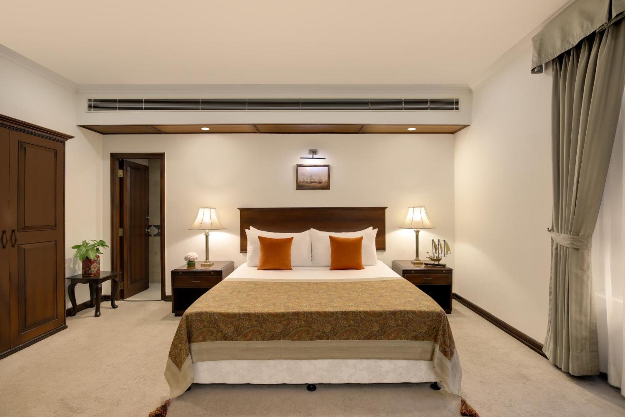 Ambassador, New Delhi - Ihcl Seleqtions Hotel Bagian luar foto A bedroom at the Taj Bengal